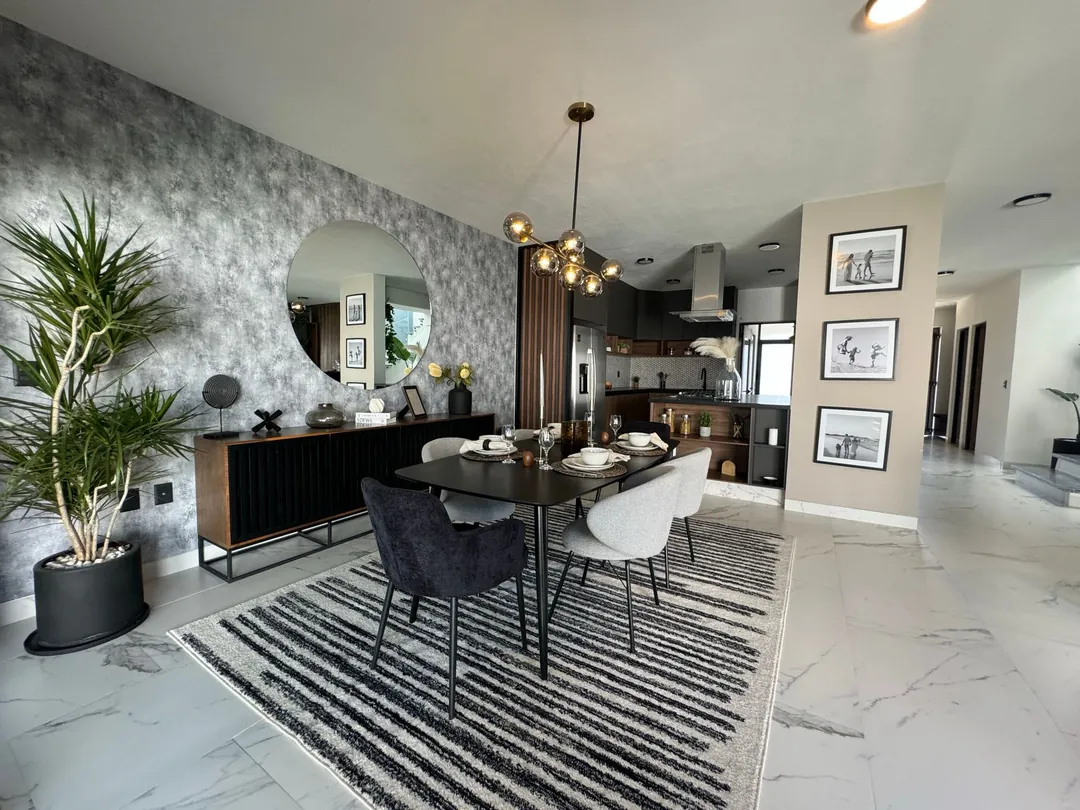 Sala de estar y escaleras en vivienda de diseño moderno